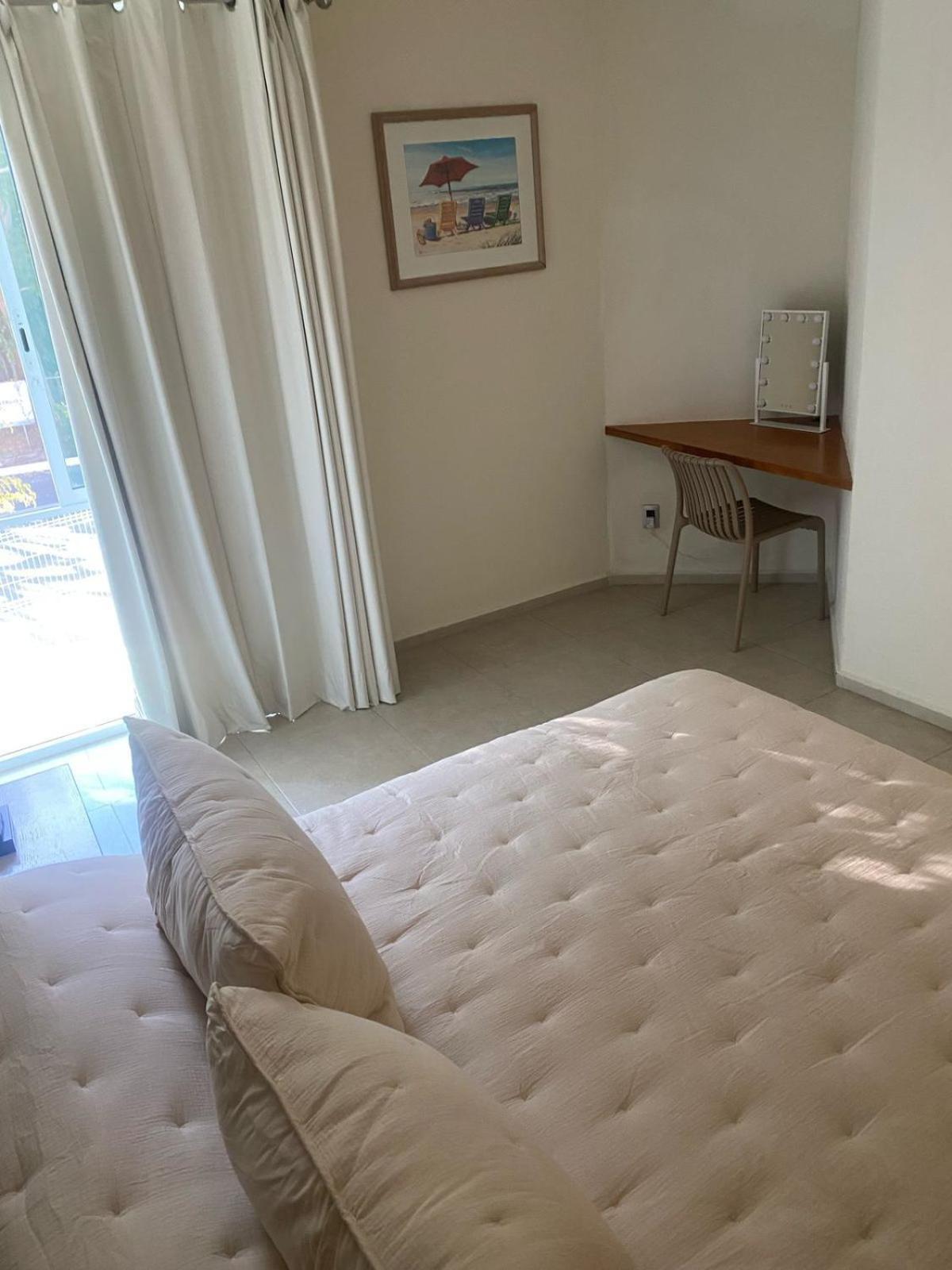 Villa En *