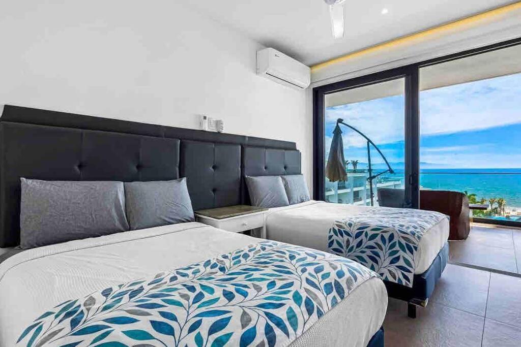Apartamento ~beach Front~stunning Views~free Airport Transport