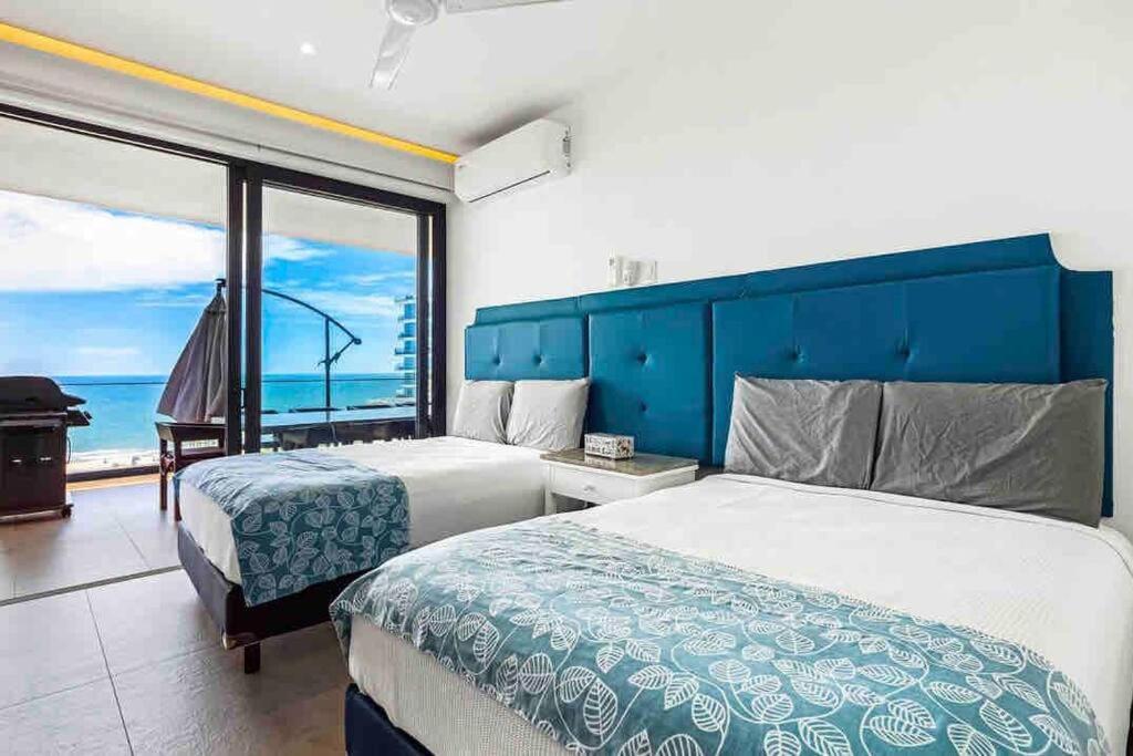 ~beach Front~stunning Views~free Airport Transport Apartamento *