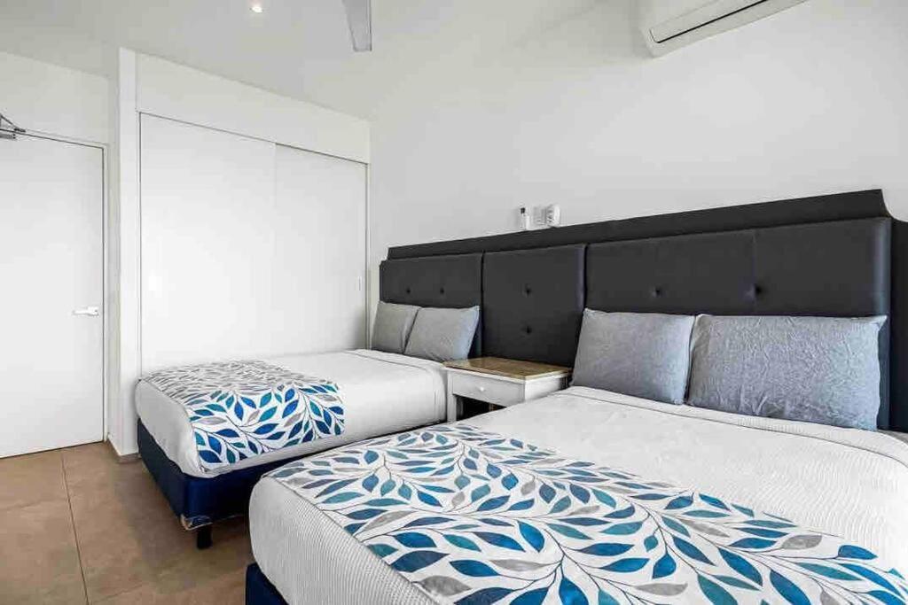 Apartamento ~beach Front~stunning Views~free Airport Transport *