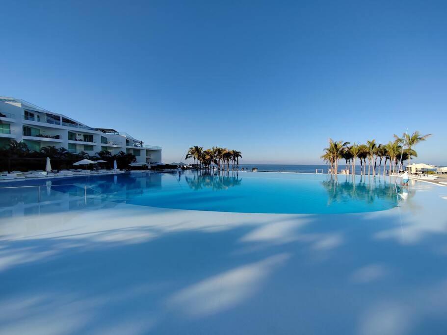 Beachfront Bliss At Aria Ocean Flamingos Apartamento