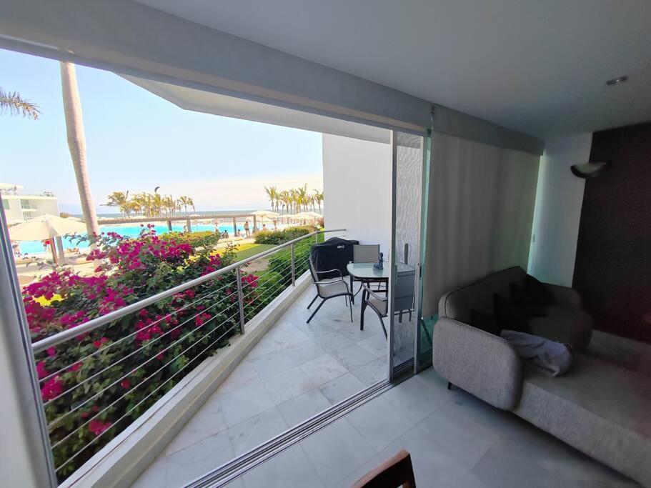 Beachfront Bliss At Aria Ocean Flamingos
